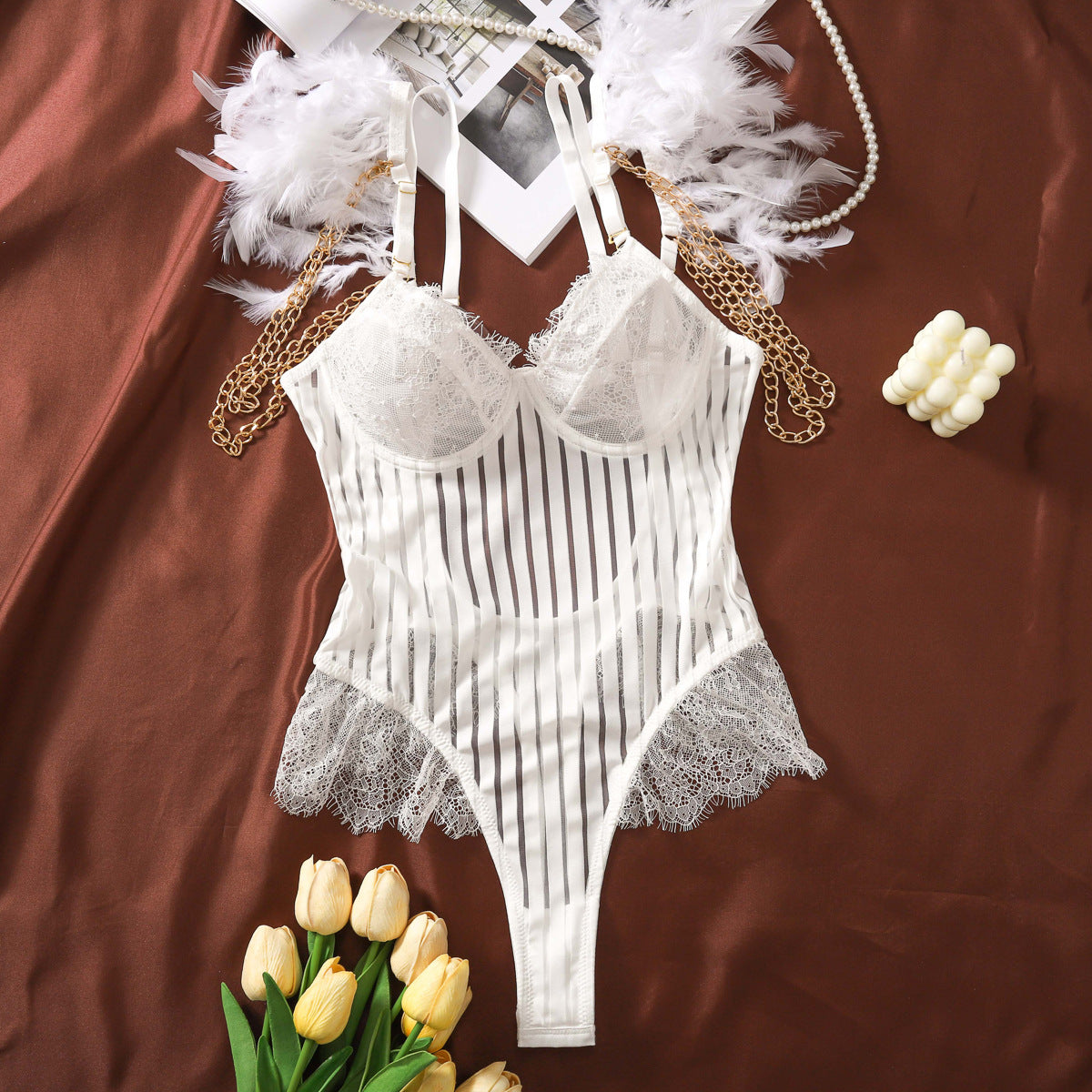 Lace patchwork vertical mesh U-shaped backless feather shaping one-piece outfit with a fun touch