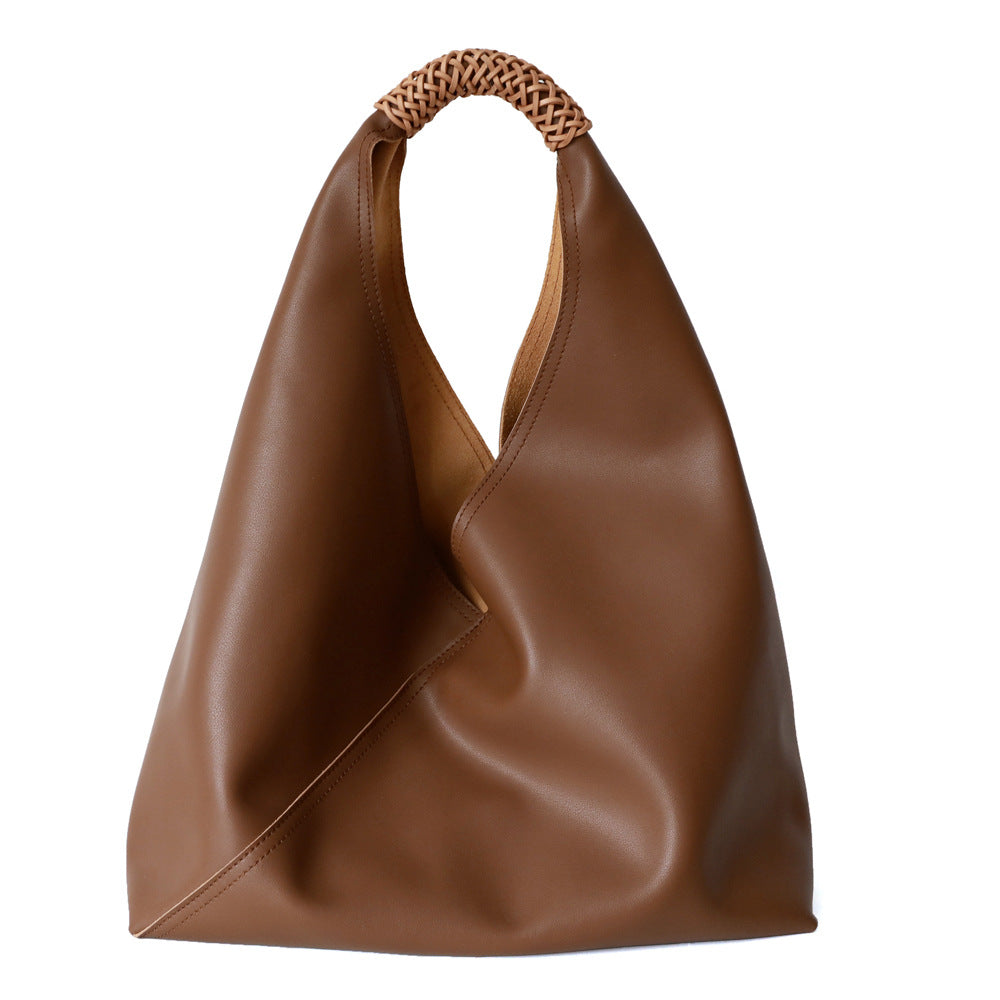 Leather bag with woven handle