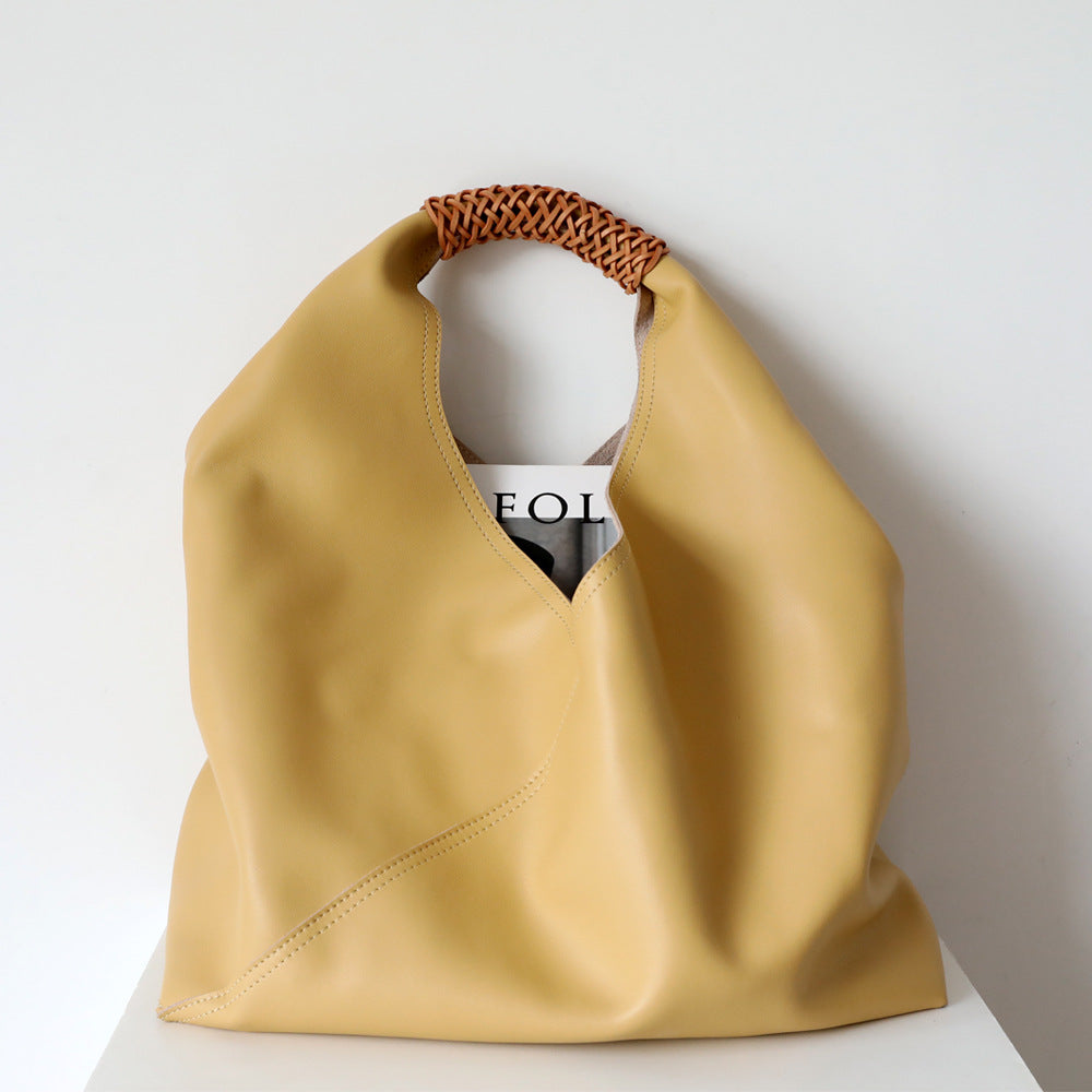 Leather bag with woven handle