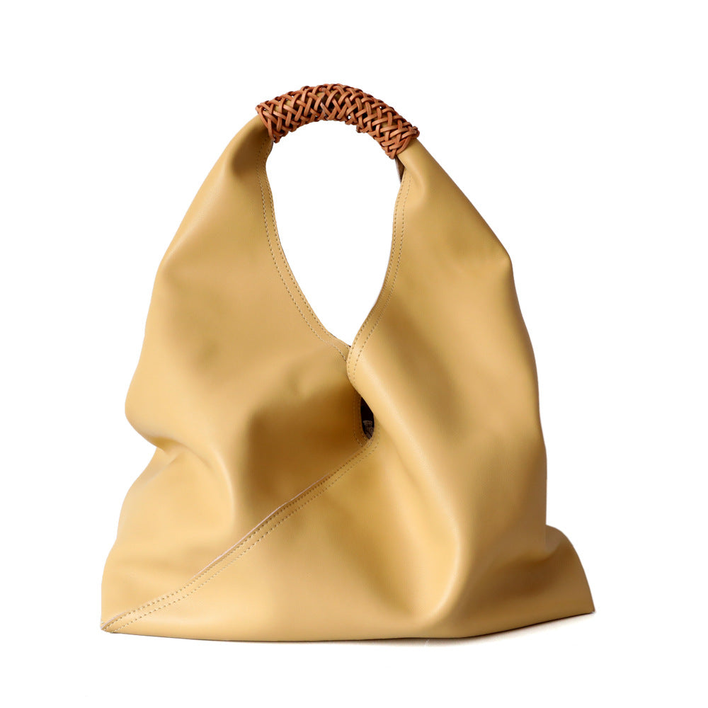 Leather bag with woven handle